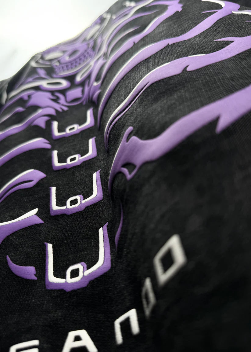 Close-up of a black and purple athletic outfit with branding.